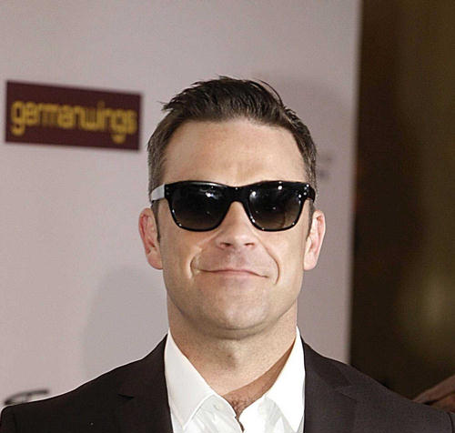 Robbie Williams oterao publiku s koncerta Take That Robbie Williams Robbie Williams oterao publiku s koncerta Take That